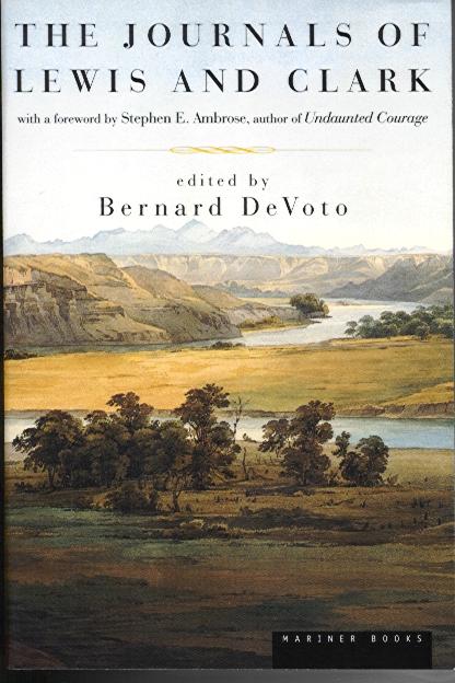 The cover for the book "The Journals of Lewis and Clark" edited by Bernard DeVoto with a depiction of a vast landscape and a winding river passing through.