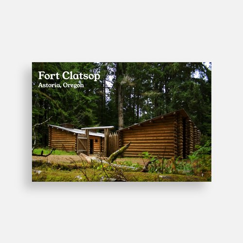 A photograph of the second replica of fort clatsop, a 50 foot wide entrance with a log gate swung open, roofs sloped inwards, in a middle forest clearing.