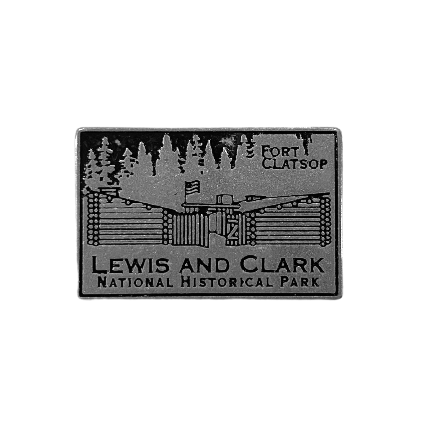 A small rectangular token with a depiction of Fort Clatsop and reading "Fort Clatsop Lewis and Clark National Historical Park"