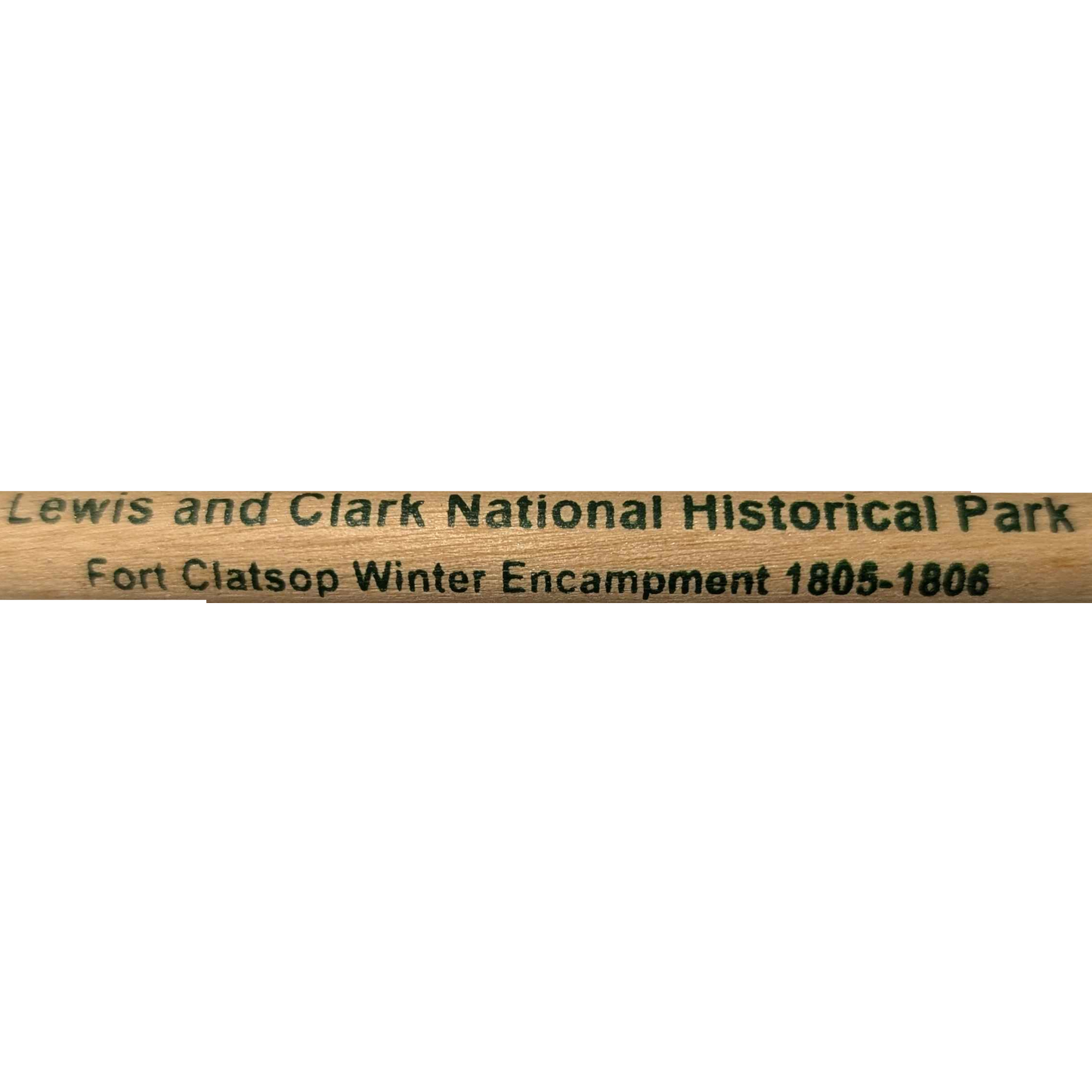 A natural wood pencil with green text: "Lewis and Clark National Historical Park Fort Clatsop Winter Encampment 1805-1806"