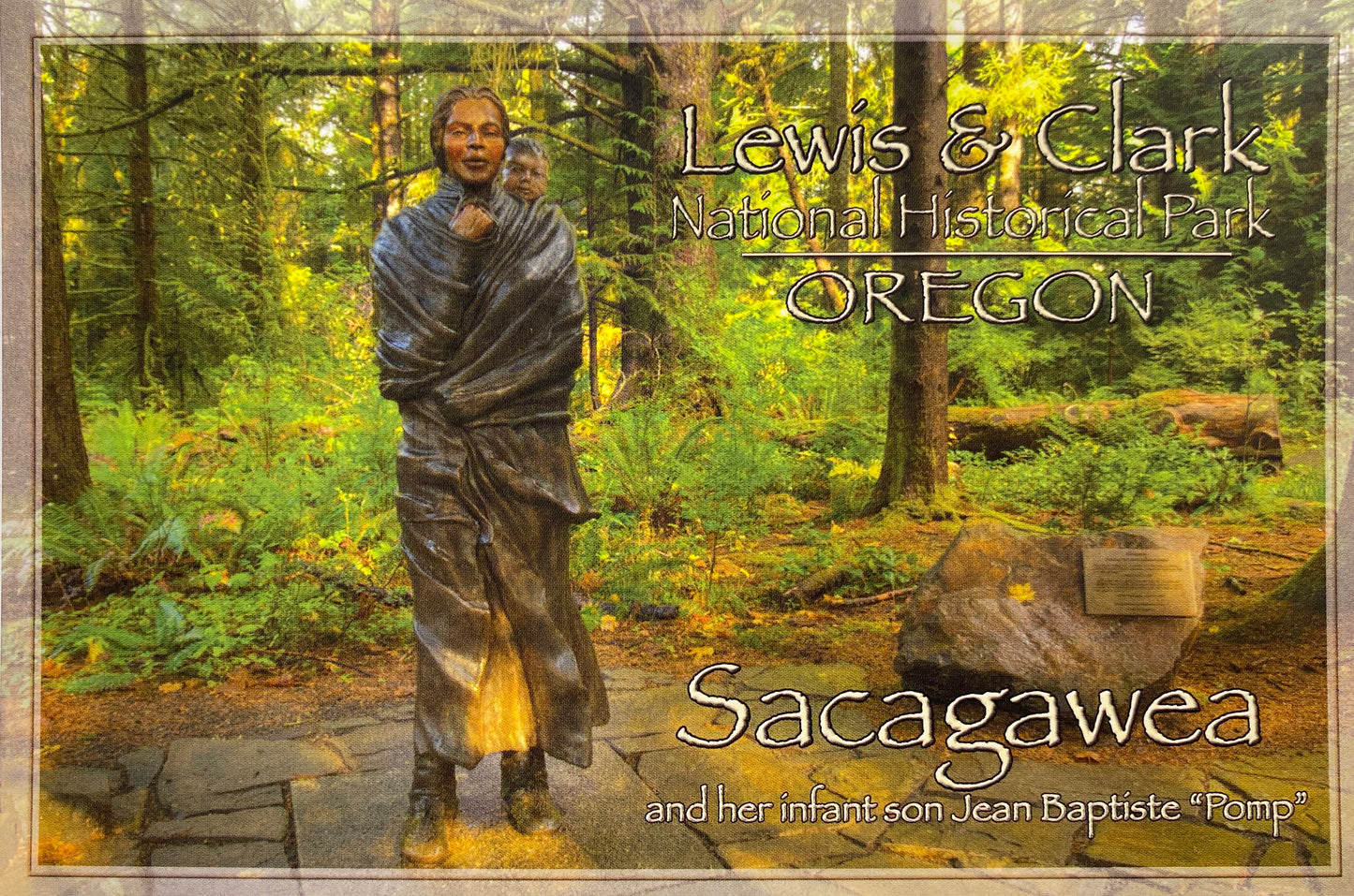 A postcard with a photograph of the Sacagawea statue on it, text on top reading "Lewis & Clark National Historical Park. Oregon. Sacagawea and her infant son Jean Baptiste "Pomp"