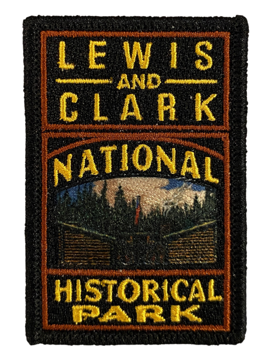 A rectangular patch split into 3 sections from top to bottom. The top says "Lewis and Clark," the middle reads "National" with a depiction of Fort Clatsop, and the bottom reads "Historical Park."