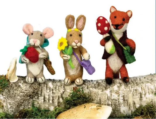 Pre-packaged foraging friend ornaments with a fox, rabbit, and mouse on a branch with text about pricing and savings.